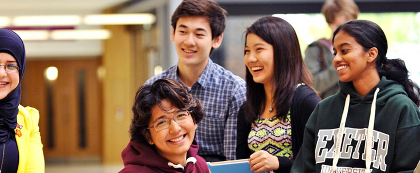 Smiling group of students gathered together, representing camaraderie in HND courses.