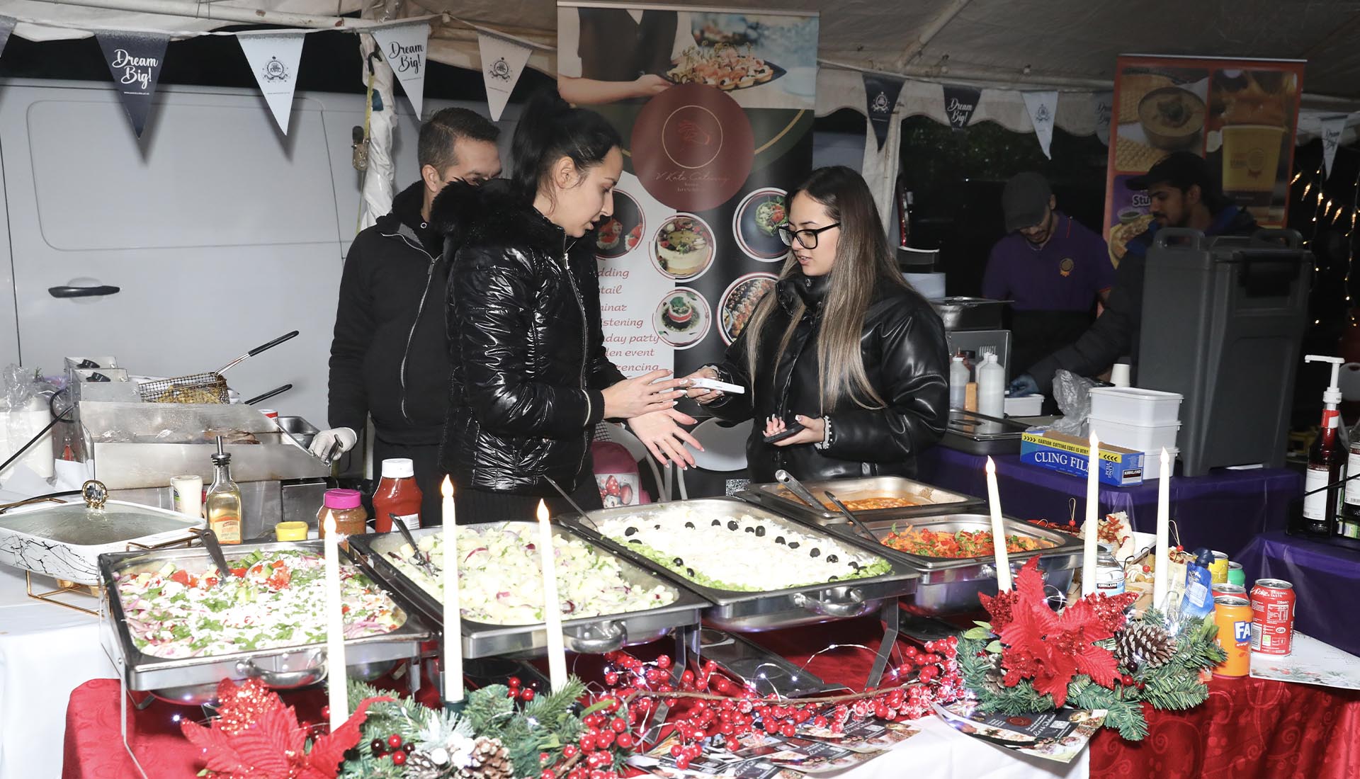 A food stall at the Mont Rose College Christmas Fair 2024, featuring festive decorations and delicious holiday dishes.