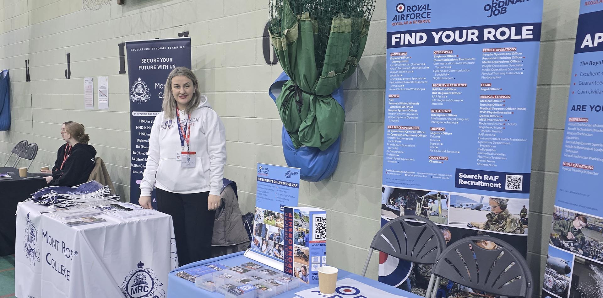Mont Rose College representative at the Caterham High School Careers Fair, showcasing educational programs and career opportunities.