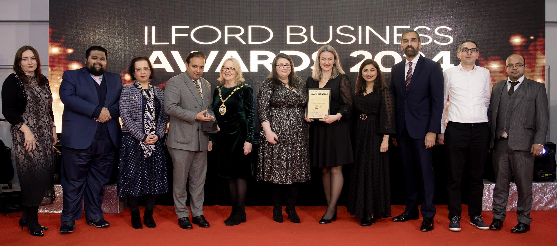 Mont Rose College team receiving recognition at the Redbridge Business Awards 2024, celebrating local business excellence.