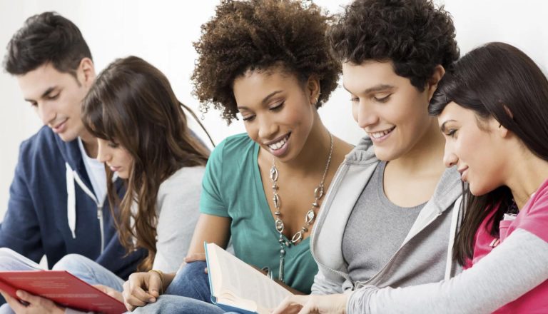 A diverse group of students studying together, showcasing collaboration and interactive learning in an HND Course environment.