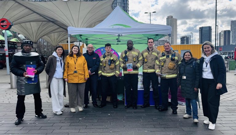 A group of firefighters and Mont Rose College representatives at the National Battery Day Awareness Event promoting battery recycling.