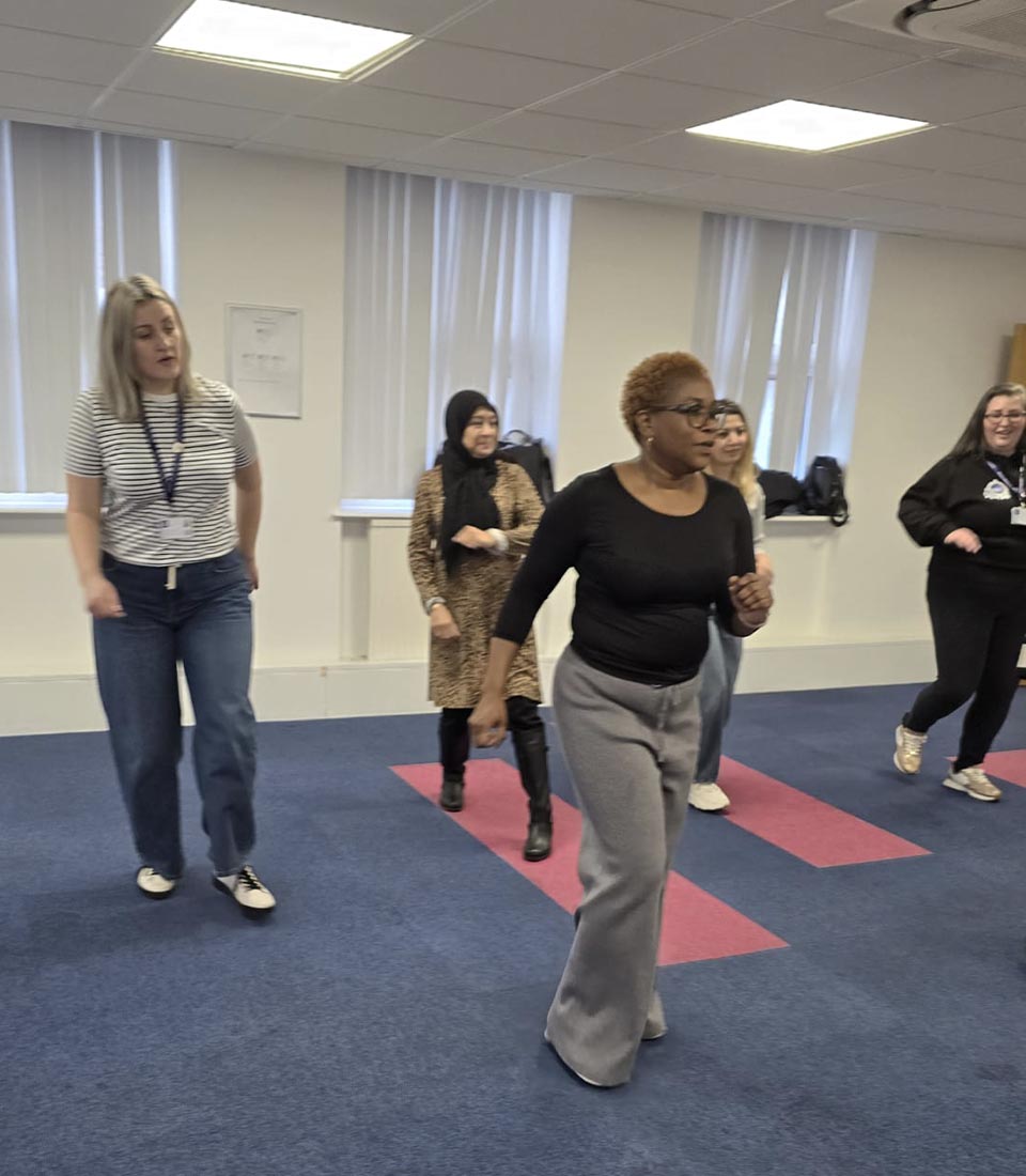 A group of women enjoying a dance session. Zumba Fusion Fitness Meets Fun at Mont Rose College brings energy and excitement.