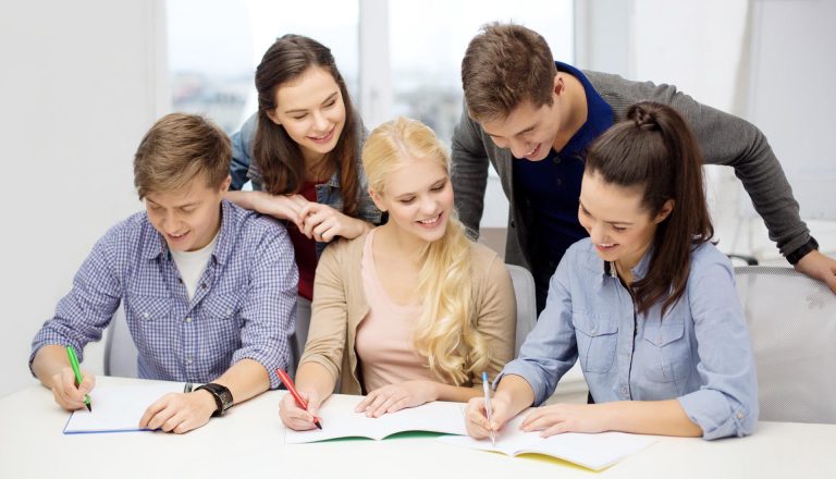 Students collaborating in a classroom, representing the Flexibility of HND Programs and adaptable learning opportunities.