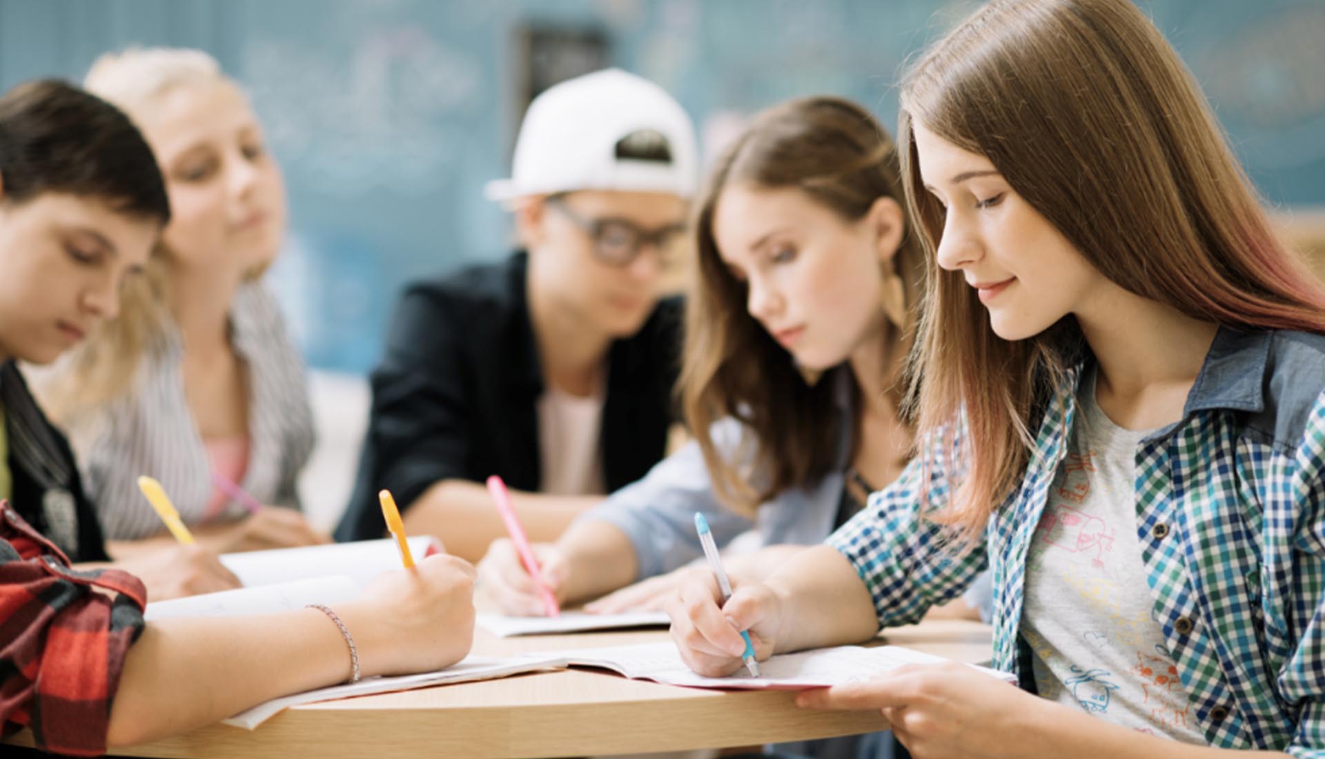 Students studying together in a classroom, highlighting the Flexibility of HND Programs and diverse learning opportunities.