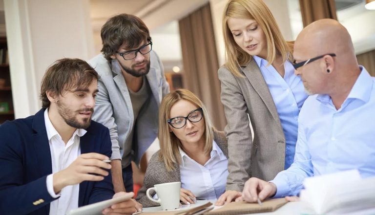 Group of professionals collaborating on a project, representing HNDs and Entrepreneurship in action.