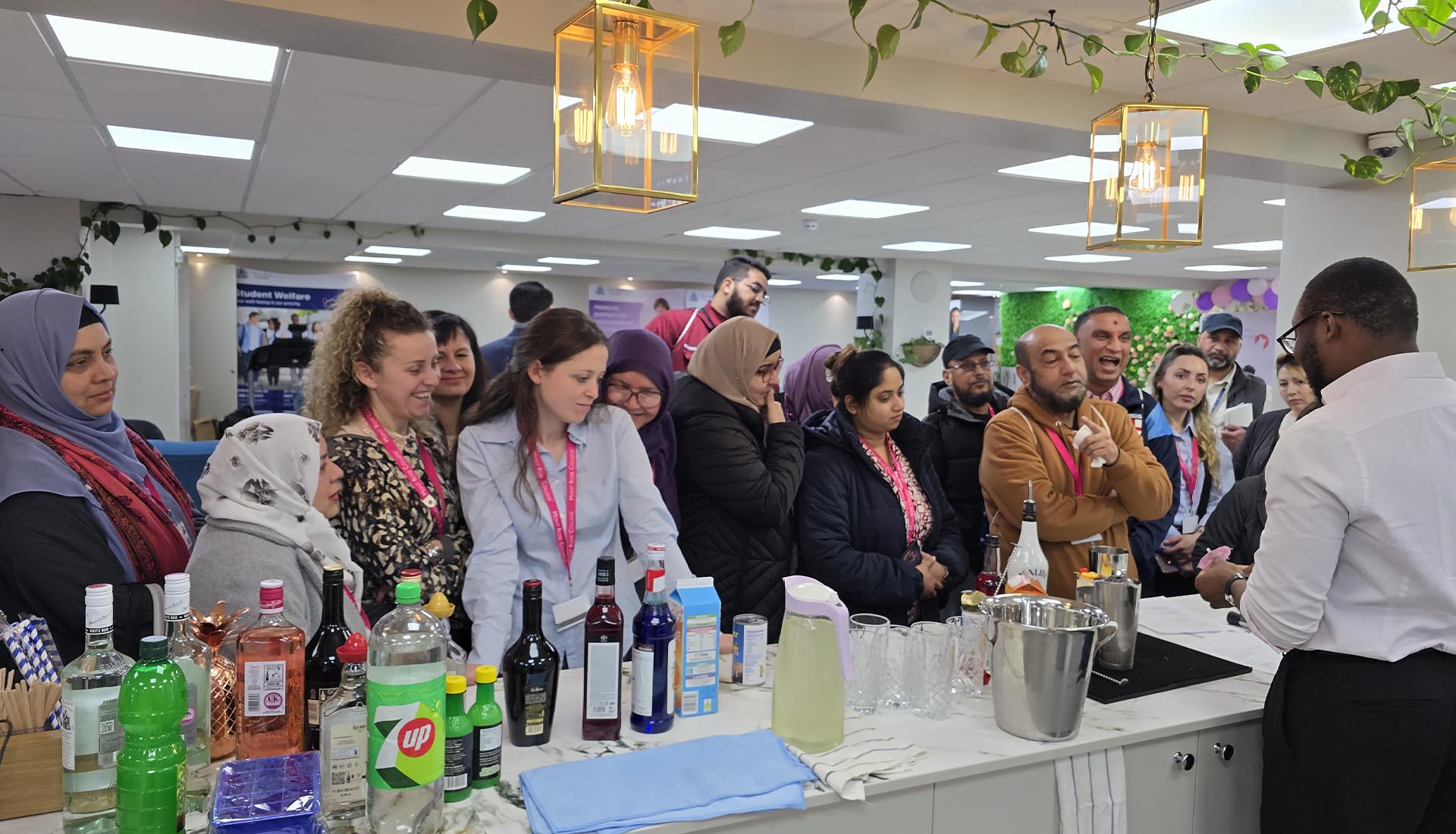Students participate in a Hospitality Practical Workshop cocktail demonstration, observing beverage preparation techniques at Mont Rose College.