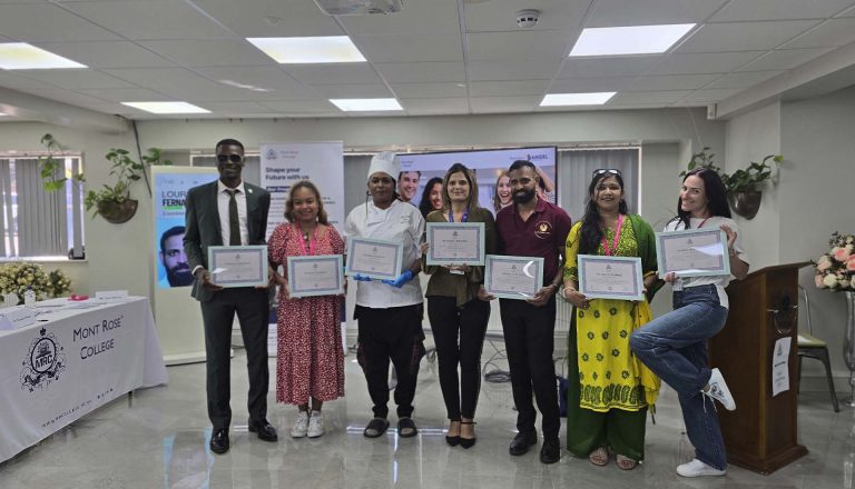 Group of Angel Competition participants proudly holding certificates at Mont Rose College during the award ceremony celebration.