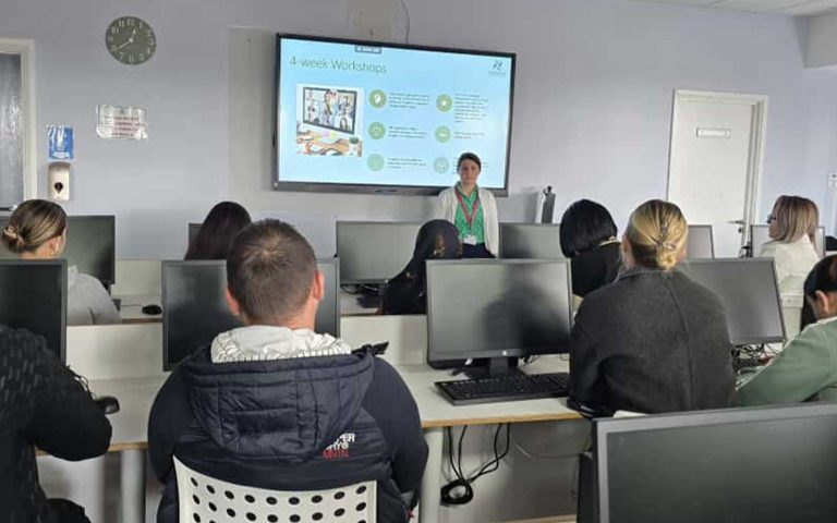 Students attending an Energise Programme session at Mont Rose College, with presenter explaining a 4-week workshop on screen.
