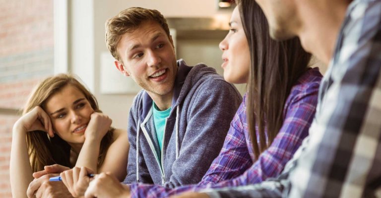 Students having a discussion in a study setting, representing conditional offers for an HND course.